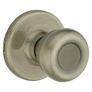 Tylo Passage Door Knob, Antique Brass Finish